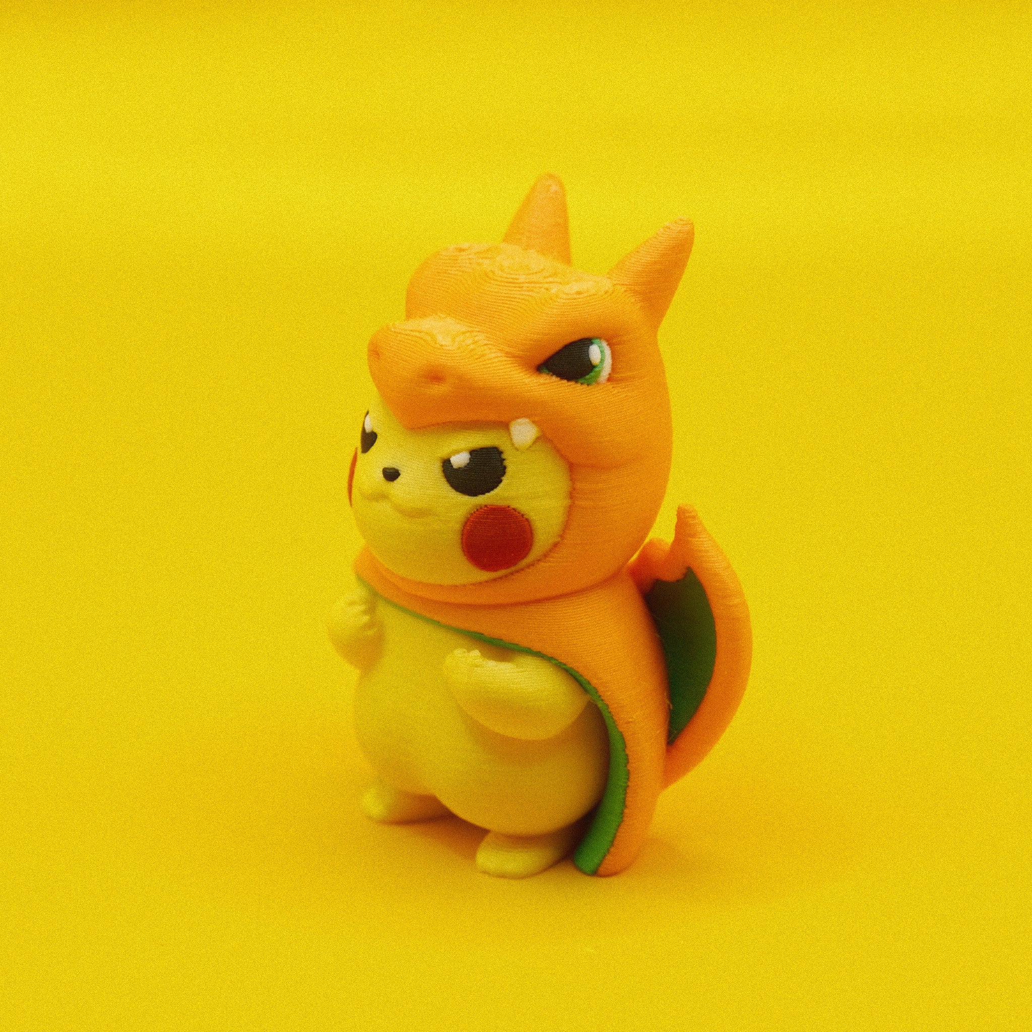 Pikachu in Charizard Costume