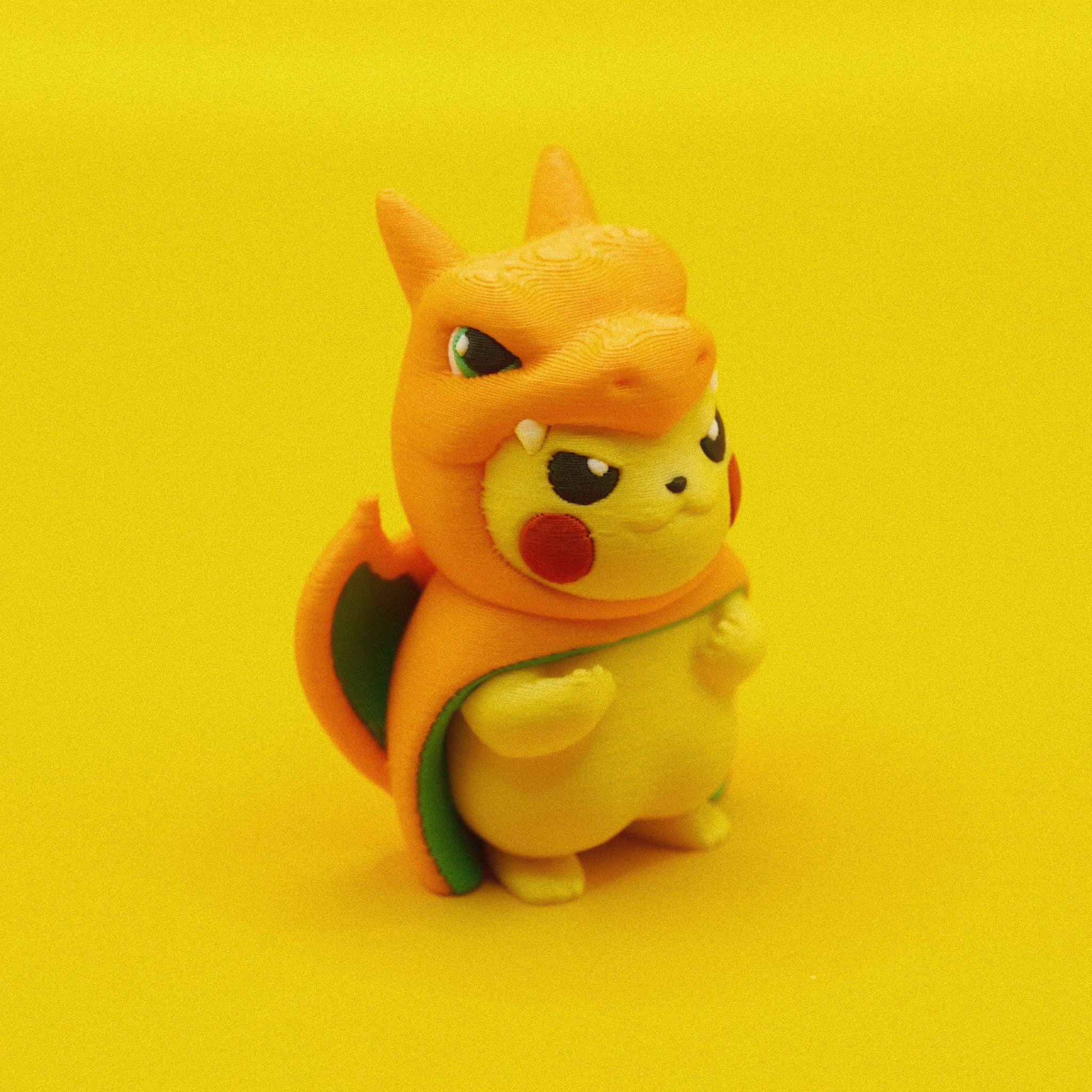 Pikachu in Charizard Costume